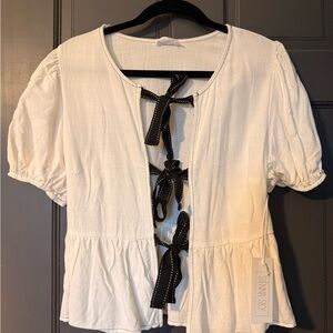 Sienna Sky Cream Peplum Top with Black Ribbon Ties
